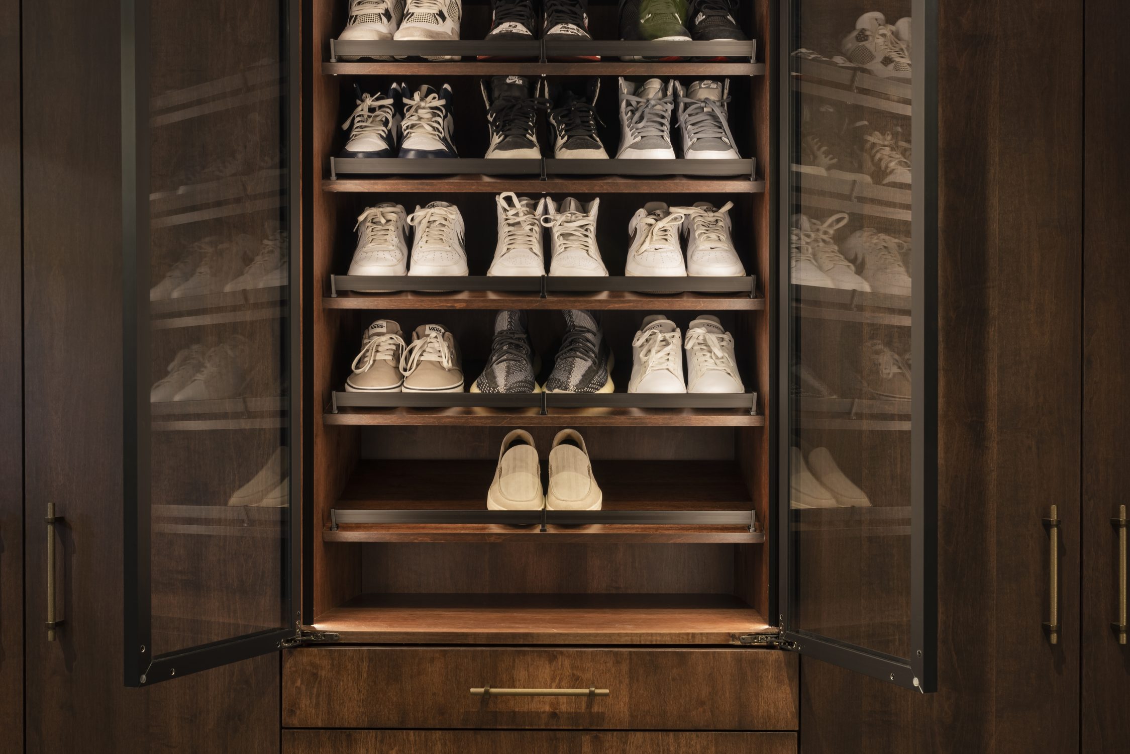 Custom walk-in wardrobe with glass-front shoe display, detail view, by Pro-Con Construction