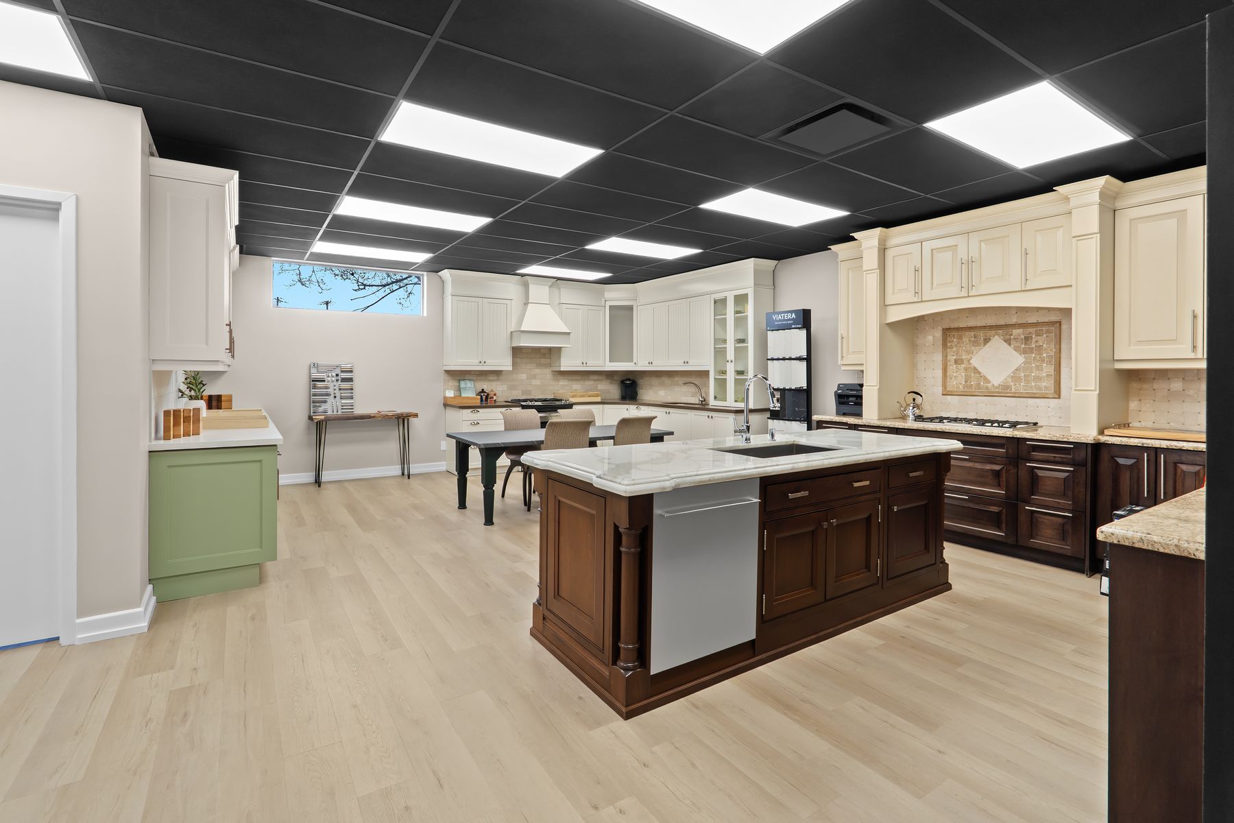 Pro-Con Construction showroom floor featuring multiple custom kitchen displays